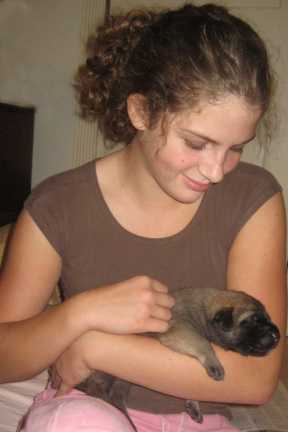 Breanna with a Mastiff puppy